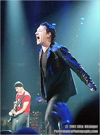 Live concert photo of Bono, The Edge (R-L)