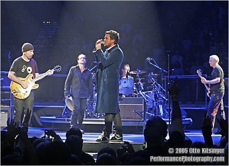 Live concert photo of The Edge, Bono, Brandon Flowers of The Killers, Larry Mullen Jr, Adam Clayton