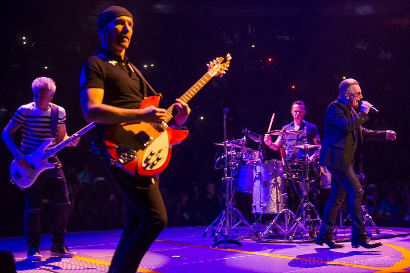 Live concert photo of Adam Clayton, The Edge, Larry Mullen Jr, Bono