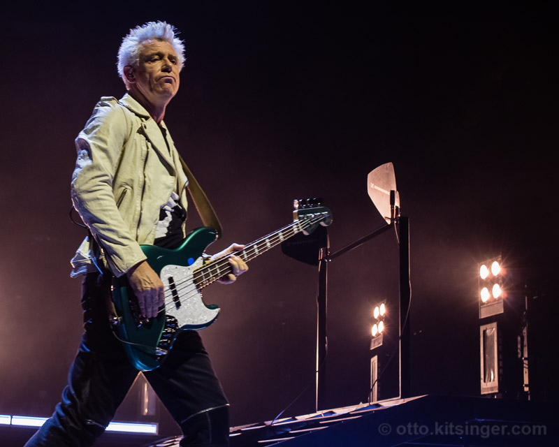 Live concert photo of Adam Clayton