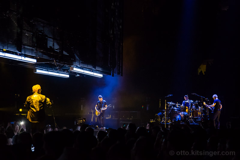 Live concert photo of Bono, The Edge, Larry Mullen Jr, Adam Clayton