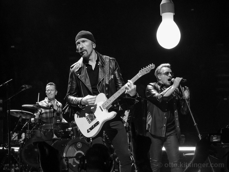 Live concert photo of Larry Mullen Jr, The Edge, Bono