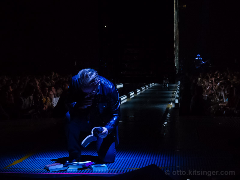 Live concert photo of Bono, Adam Clayton