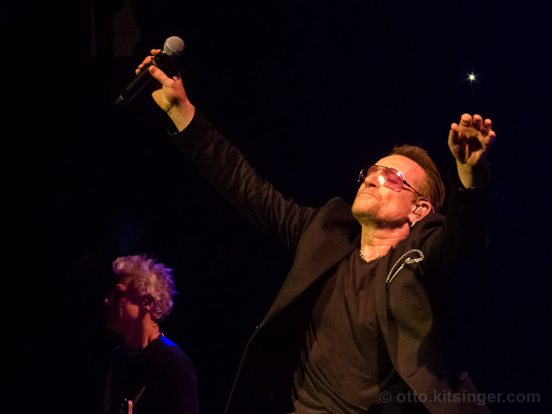 Live concert photo of Adam Clayton, Bono