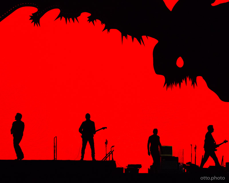 Live concert photo of Bono, The Edge, Larry Mullen Jr, Adam Clayton