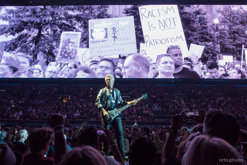 Live concert photo of Adam Clayton