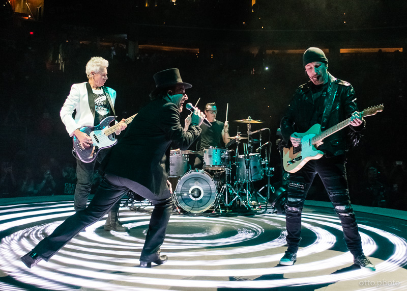 Live concert photo of Adam Clayton, Bono, Larry Mullen Jr, The Edge